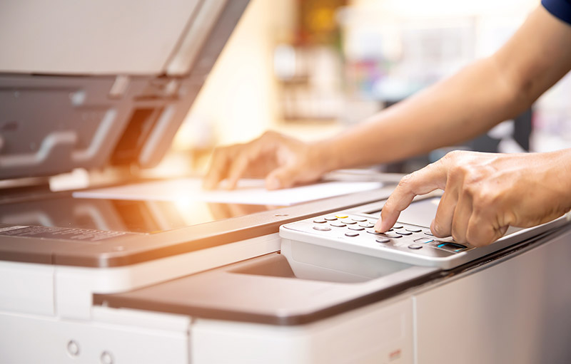 Man using a copy machine